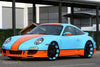 Custom painted Porsche slot car bodies.