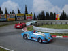 Custom painted HO slot cars.