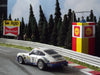 Custom painted HO slot cars.
