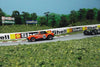 Resin Porsche slot cars on AFX track.