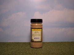 Beige fine gravel scenic material in shaker bottle.