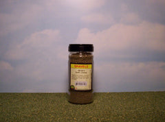 Earth coarse gravel scenic material for dioramas & slot car scenery.